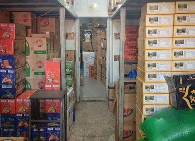 کشف انبار میلیاردی مواد غذایی احتکارشده در آستانه اشرفیه